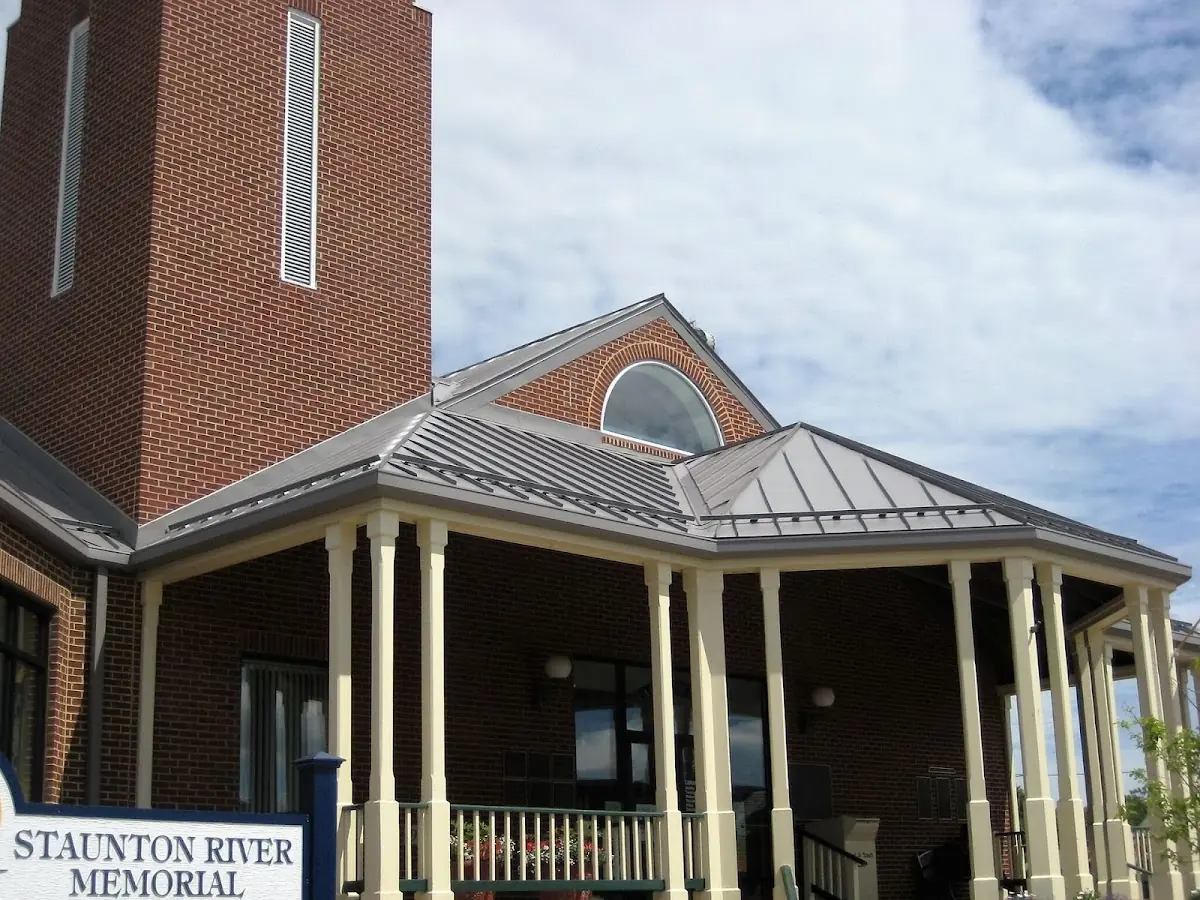 Skilled roofing craftsmen working on a residential roof in Scranton